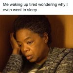Person waking up tired and confused about sleep benefits.