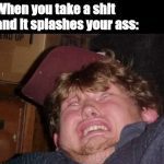 Man making a funny face reacting to toilet water splash.