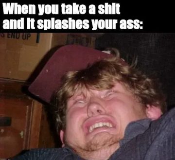 Man making a funny face reacting to toilet water splash.