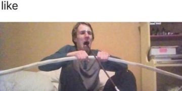 Person humorously using a bow to convey dark humor.