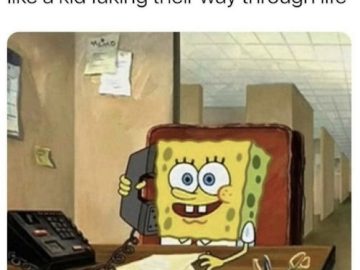 SpongeBob at a desk with phone, feeling like a kid at work.