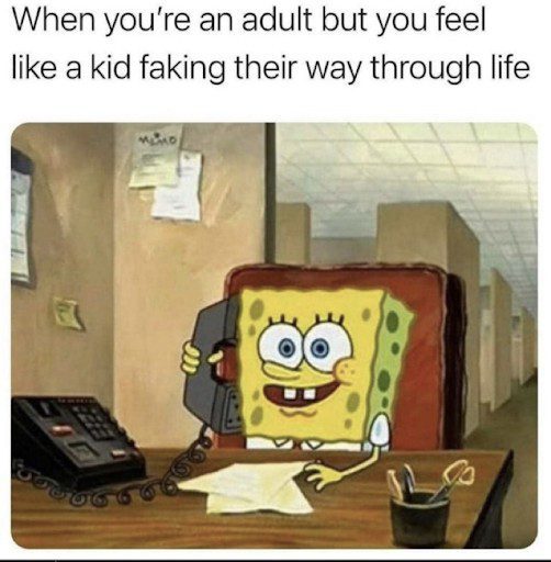 SpongeBob at a desk with phone, feeling like a kid at work.