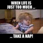 Sleepy child taking a nap, captioned "When life is just too much."
