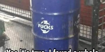 A barrel labeled "FUCHS" with a humorous caption about keeping it full