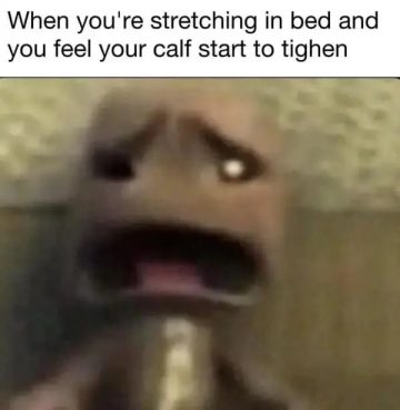 Funny meme of a shocked face reacting to a calf cramp in bed.