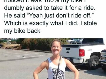 Person standing with reclaimed bike after stealing it back from a thief.