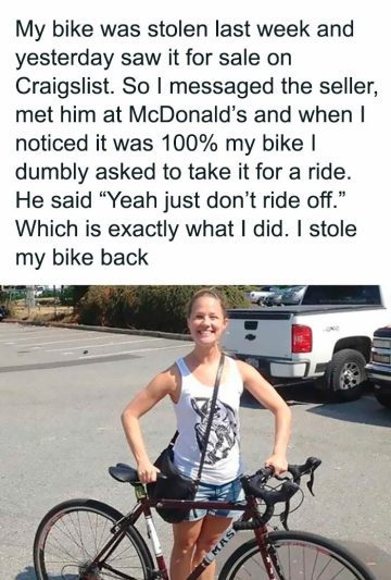 Person standing with reclaimed bike after stealing it back from a thief.