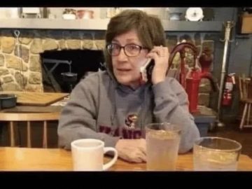 Woman humorously calling in sick to a place she doesn't work at.