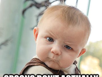 Baby looking confused, questioning why spoons don't sound like airplanes.