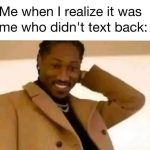 Smiling person realizing they forgot to text back.