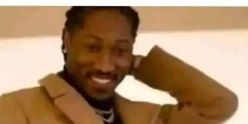 Smiling person realizing they forgot to text back.