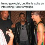 Three men making a humorous reference to "Rock formation."