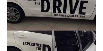 Car ad with open door creating funny message, "Experience the D."
