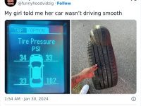 Car tire pressure display with one tire at 102 PSI and a distorted tire.