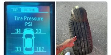 Car tire pressure display with one tire at 102 PSI and a distorted tire.