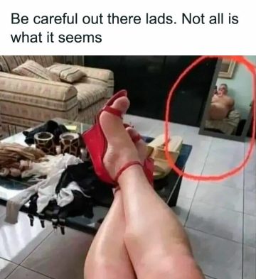 A humorous photo fail revealing unexpected reality in reflection.