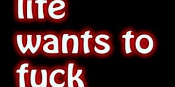 Meme with the text "at least life wants to mess with me" in bold letters.