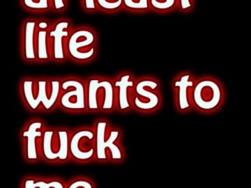 Meme with the text "at least life wants to mess with me" in bold letters.