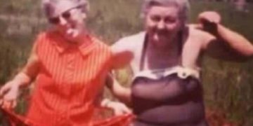 Two older women having fun, joking about outliving husbands.