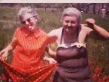 Two older women having fun, joking about outliving husbands.