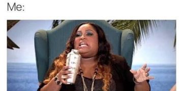 Woman drinking a margarita to cope with work stress.