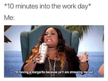 Woman drinking a margarita to cope with work stress.