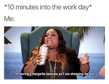Woman drinking a margarita to cope with work stress.