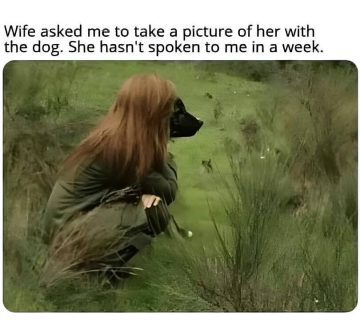 Woman crouching in a field with a dog's face; humorous mix-up.