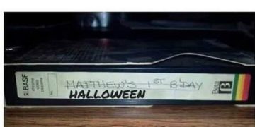 VHS tape labeled Halloween over Matthew's first birthday.
