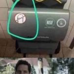 Confused man wondering about Dyson hand dryer instructions.