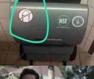 Confused man wondering about Dyson hand dryer instructions.