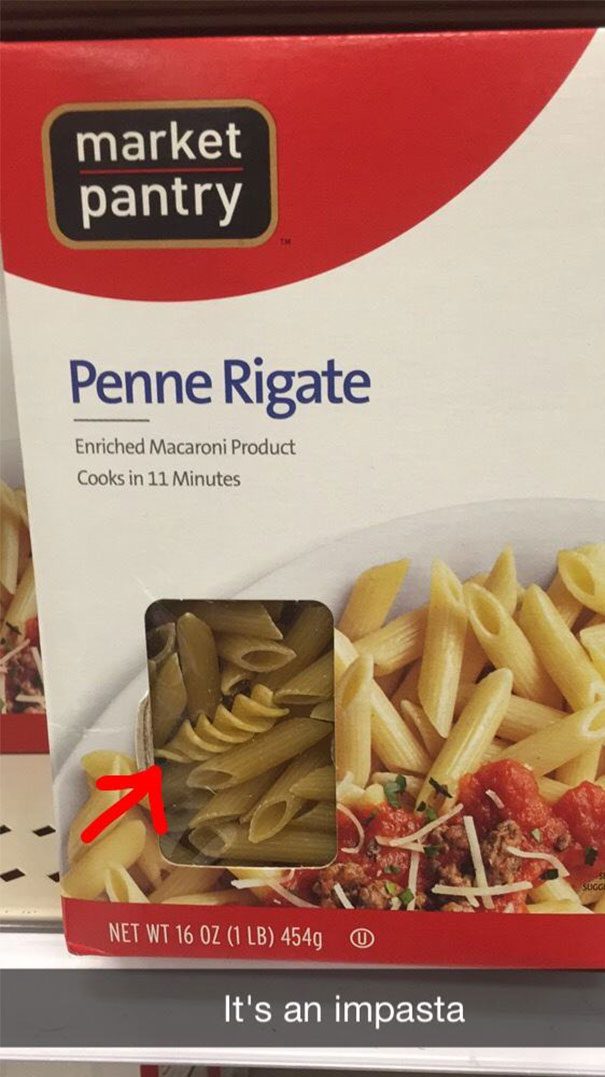 Close-up of penne pasta box showing a different pasta type inside.