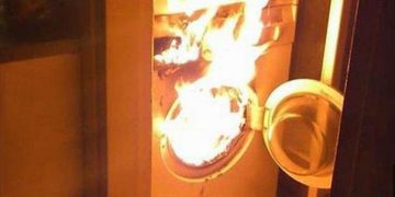 Washing machine on fire, laundry fail with caption about first-time washing.