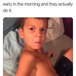 Kid making an annoyed face after being woken up early.