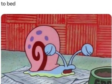 Cartoon snail looking exhausted, symbolizing morning tiredness.