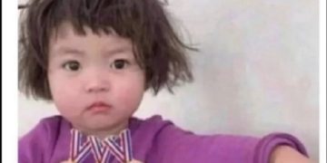 Child with three gold medals for napping as an Olympic sport.