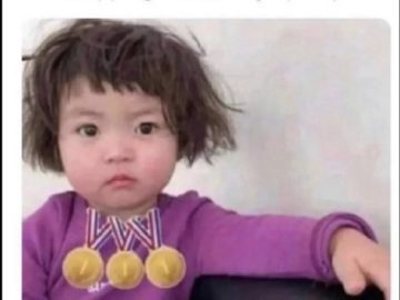 Child with three gold medals for napping as an Olympic sport.