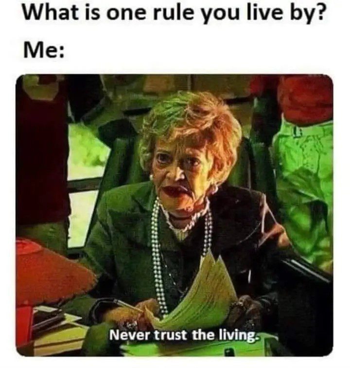 Elderly lady with text: Never trust the living.