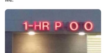 Sign reading "1-HR POO" as an excuse for being late.