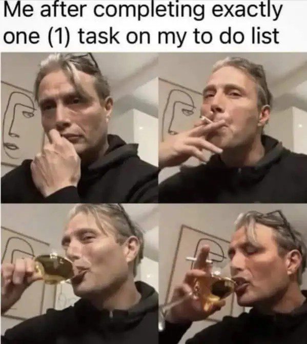Person celebrates after completing one task from to-do list with drink