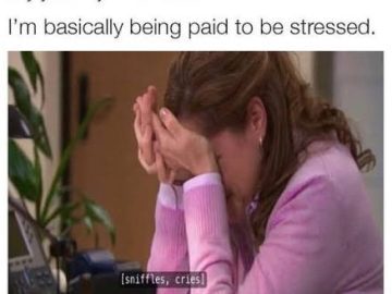Woman sitting at a desk stressed out with caption about job stress.