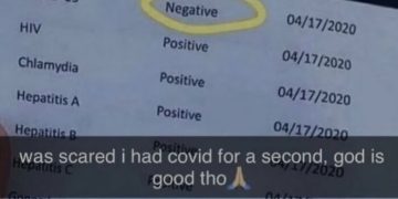 Medical test results showing negative COVID-19 result; relieved person.