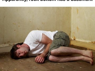 Man lying on the floor in a bare room with text about rock bottom