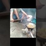 Thumbnail for a funny outdoor cooking video showing a simple fire-side moment turning into sudden chaos and a fast fail