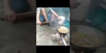 Thumbnail for a funny outdoor cooking video showing a simple fire-side moment turning into sudden chaos and a fast fail