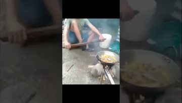 Thumbnail for a funny outdoor cooking video showing a simple fire-side moment turning into sudden chaos and a fast fail