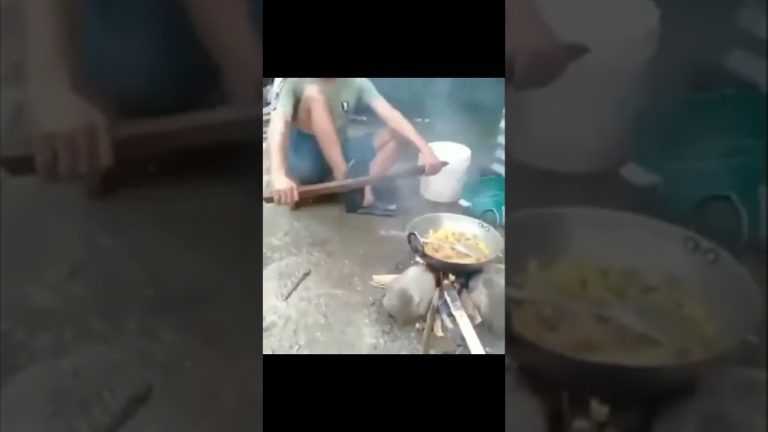 Thumbnail for a funny outdoor cooking video showing a simple fire-side moment turning into sudden chaos and a fast fail
