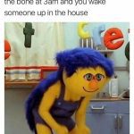 Muppet character sneaking in kitchen at 3AM, looking guilty