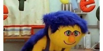 Muppet character sneaking in kitchen at 3AM, looking guilty