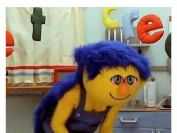 Muppet character sneaking in kitchen at 3AM, looking guilty